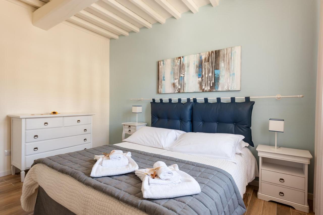 Apartamento Le Residenze Chianni Exterior foto